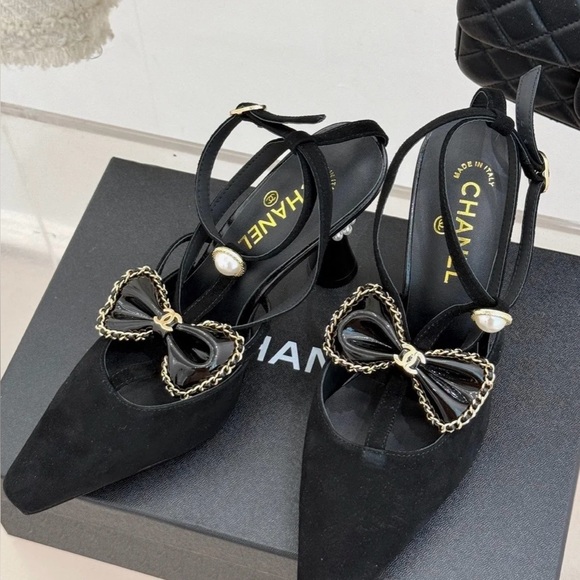 CHANEL Shoes - 100% authentic Chanel bow heels with pearl embellishment for charity sale